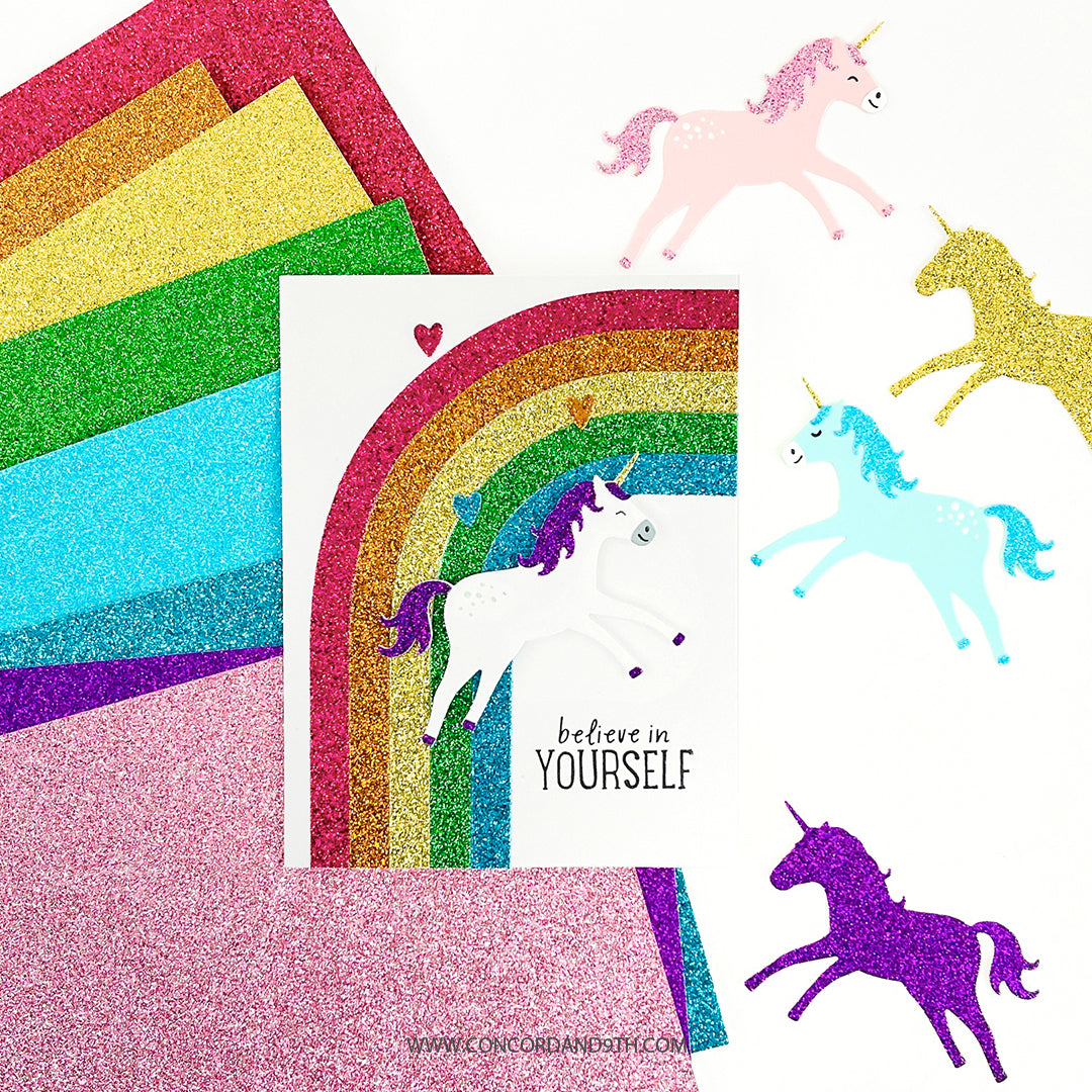 Paquete de papel con purpurina de arcoíris