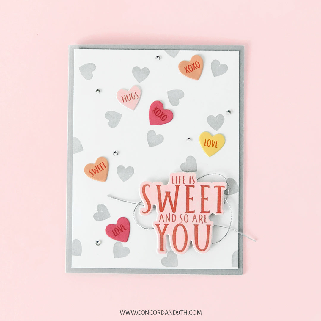 Sello Turnabout™ de corazones dispersos