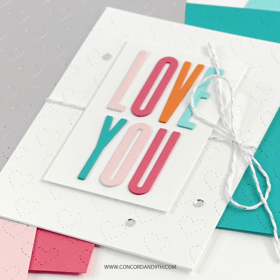 Troquel de frente de tarjeta con corazones cosidos